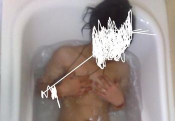 Wife having fun in bathtub