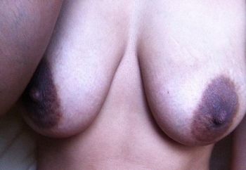 Her brown nipples