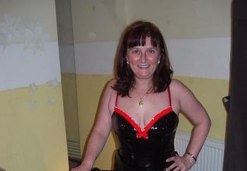 Deejay in PVC dress and boots pt2