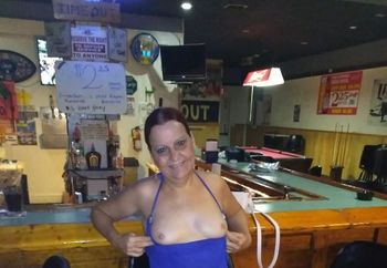 Rosemary flashing her tits at the bar