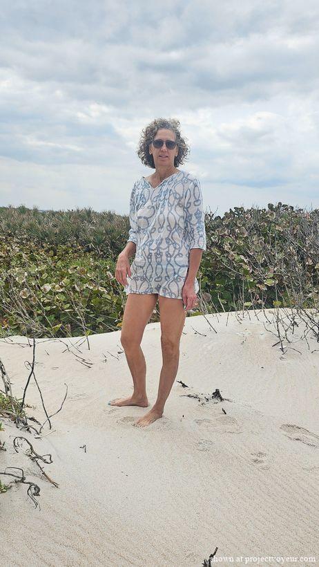 Cyndi get undressed at beach - image1
