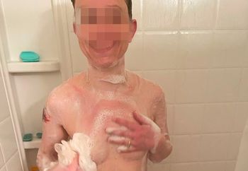 Pretty wife showering