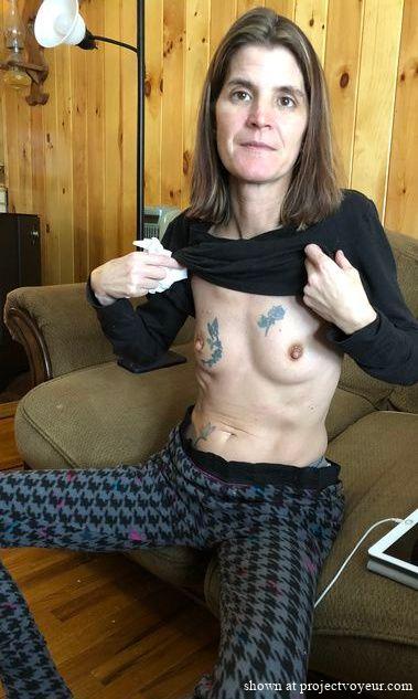 showing off her tiny tits - image5