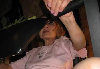 Mature woman shows herself.