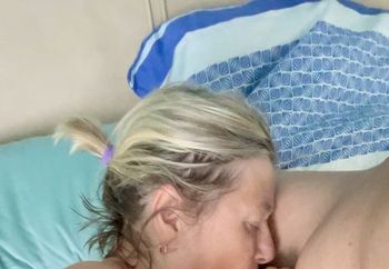 customer plays with her breasts…