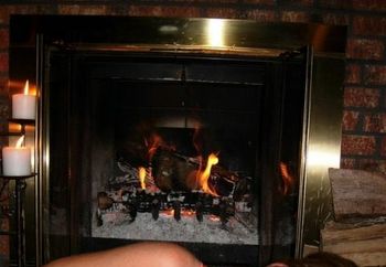 Milf Warming Up By The Fire