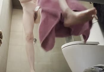 Wife drying after shower