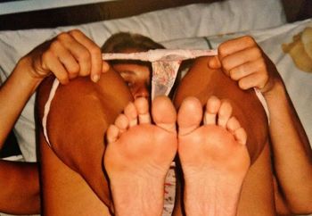 stripping off her panties, the sexy way